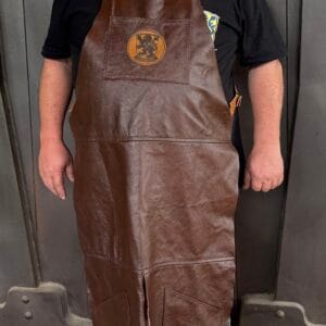 Full-length black heavy-duty leather apron for blacksmithing and outdoor cooking